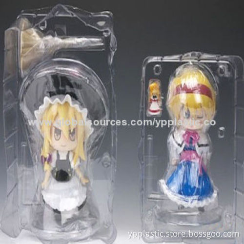 Three folded blister packs for doll display